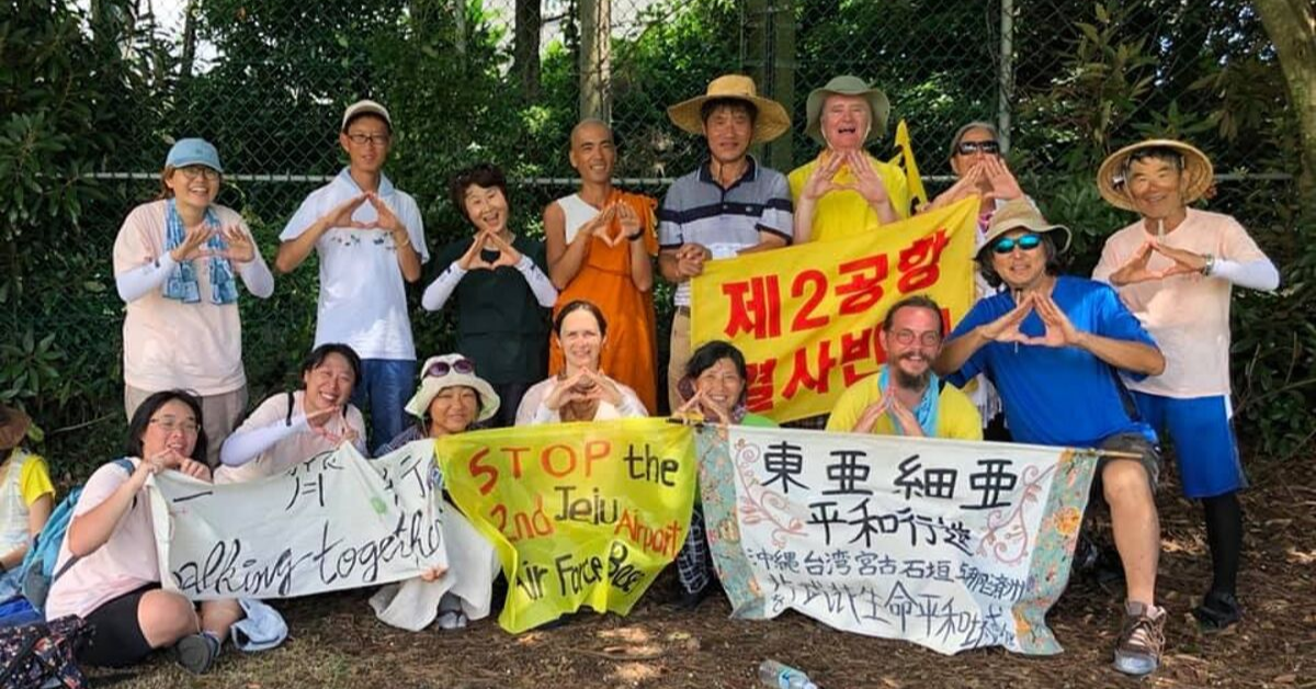 Fr. Cunningham with campaigners on Jeju Island